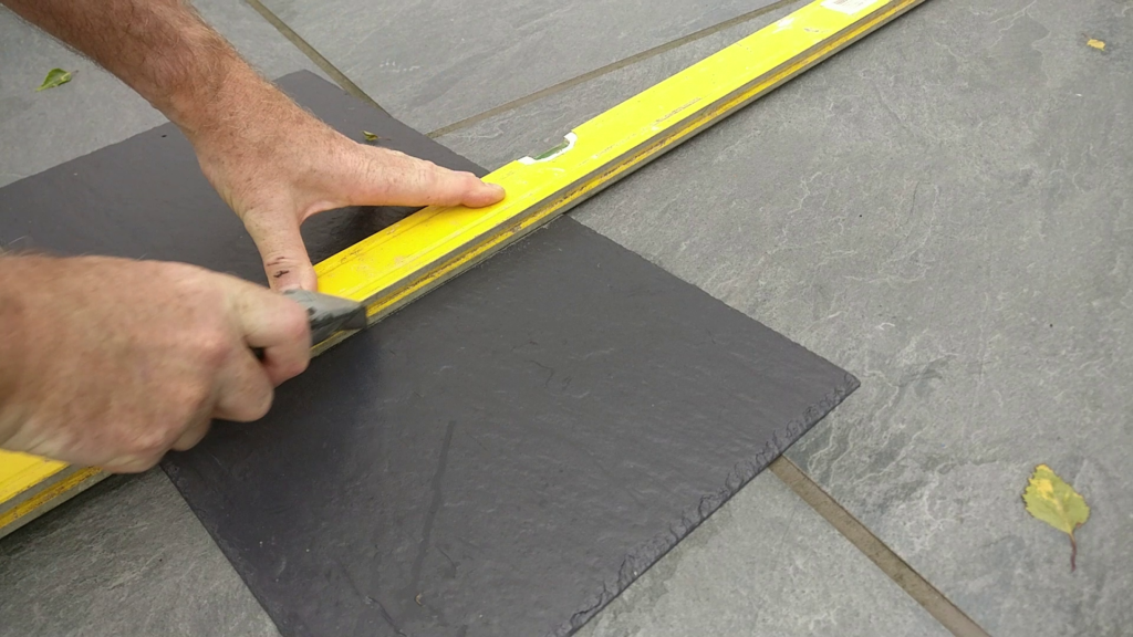 Cutting slate roof tile